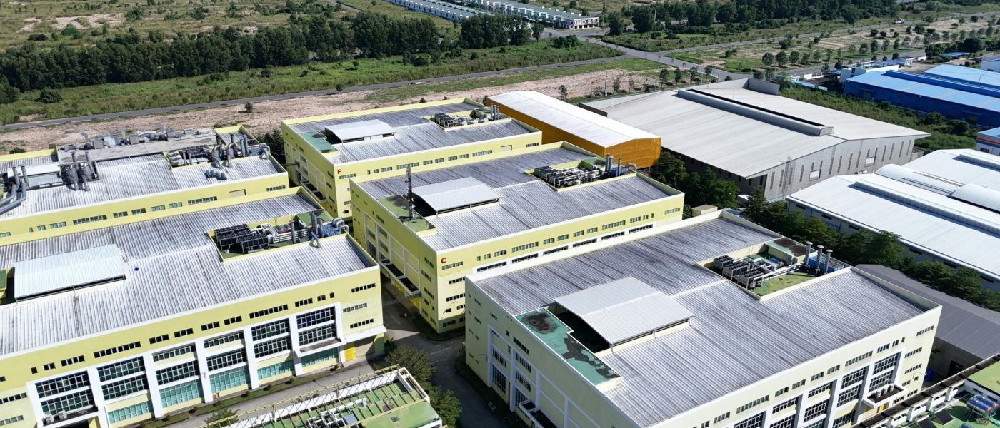 Aerial shot of modern industrial area with warehouses in Bình Dương, Vietnam.